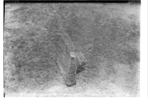 Ancient 3-legged metate - from E. side of stairway of Monjas #3.