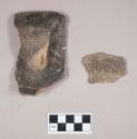 Ceramic, earthenware body sherd, dentate, possibly cord-impressed, shell-tempered; earthenware rim and handle sherd, incised, shell-tempered