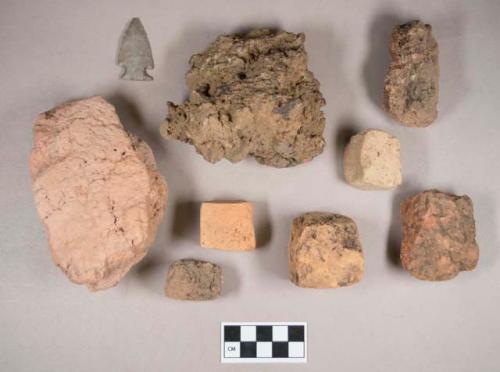 Soil samples, some cut or shaped; samples of soil and organic material with slag; chipped stone, projectile point, corner-notched