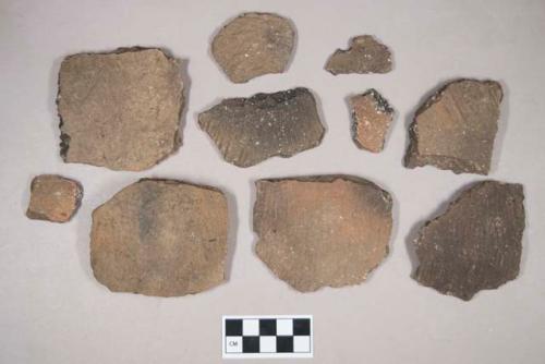 Ceramic, earthenware body sherds, cord-impressed, some shell-tempered, some grit-tempered