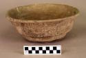 Large coarse white slipped on gray pottery ring based bowl,