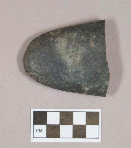 Ground stone, flat stone fragment, one end rounded