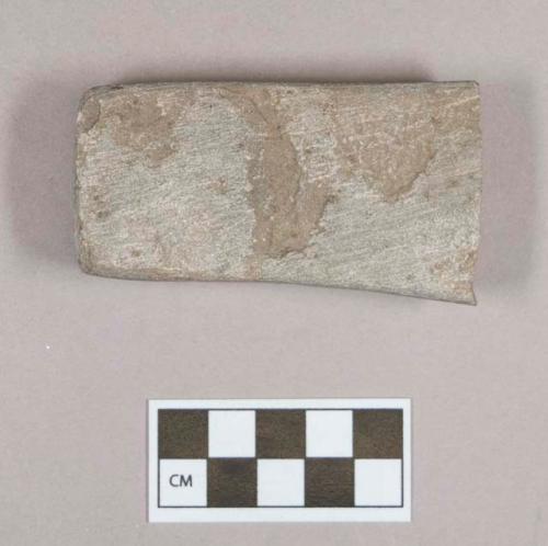 Ground stone, rectangular object fragment