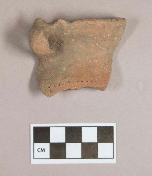 Ceramic, earthenware rim and handle sherd, incised rim, punctate body, molded rim above handle