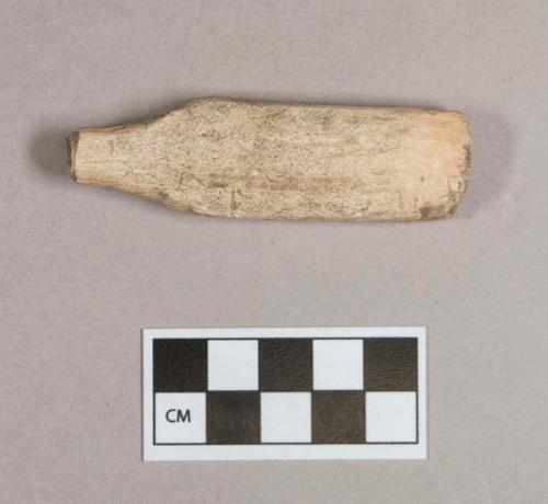 Organic, worked antler fragment, flat, one end cylindrical