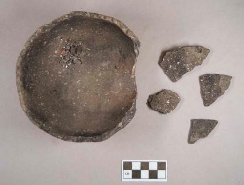 Ceramic, earthenware partial vessel and rim and body sherds, notched rim, cord-impressed body