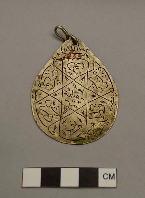 Amulet pendant with the names of the 7 sleepers of Ephesus and their dog on one side and a magic square on the other.