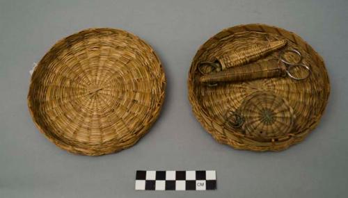 Sweet grass sewing basket with 2 pairs of scissors in holders, needle holder and thimble holder