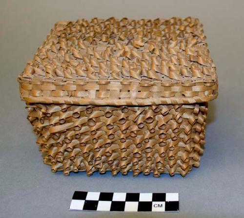 Covered square basket with twisted splint work