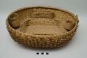 Open sewing basket with four basketry holders for notions