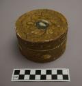 Round covered birchbark box with embroidered floral designs