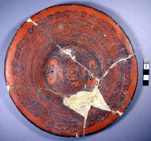 Restored plate of orange pottery-Aztec type (Type XVII)