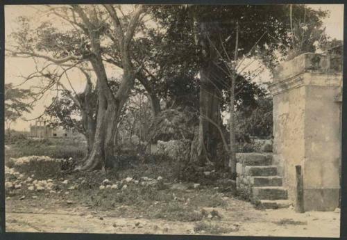 Hacienda Chichen, church in distance from gate near school house