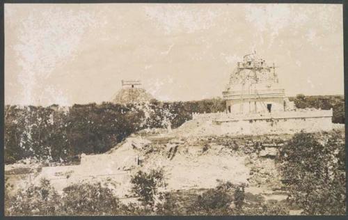 El Caracol and southwest corner of lower platform, view from Las Monjas before repair of tower