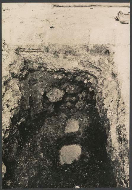El Caracol, pit at base of stairway showing fill and floor levels