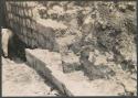 El Caracol, north side of stairway showing how balustrade was built against wall facing