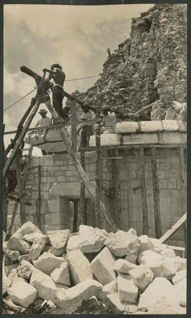 Caracol, raising block to restore in five-member cornice