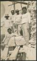 Group of workers next to Caracol