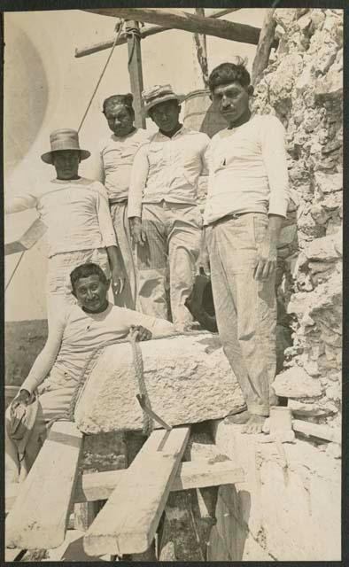 Group of workers next to Caracol