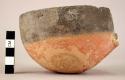 Small pottery bowl - Red Polished I Ware. Small pointed lug with perforation pla