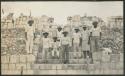 Temple of Wall Panels, group of workers on stairway