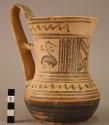 Pottery jug with high handle