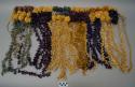 Kiekie of purple, blue and brown dyed and natural plant fiber