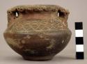 Pottery vessel with base, incised decoration