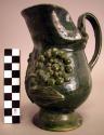 Ceramic green glazed pitcher