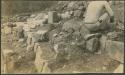 Caracol, repair of lower stairway at serpent head during excavation