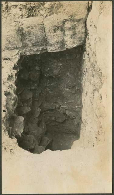 Caracol, pit at lower staircase against lower terrace