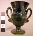 Ceramic miniature handled vessel