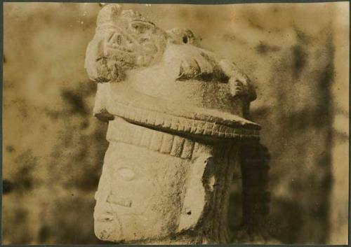 Chichen Itza, stone sculpture with serpent helmet