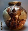 Ceramic polychrome jar with raised mermaid motif