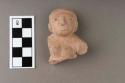 Archaic pottery figurine- woman's head and breast