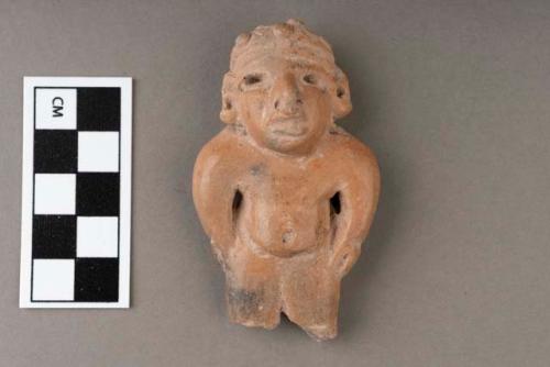 Archaic pottery figurine- legless flat figure