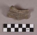 Ground stone, pipe bowl fragment, mended