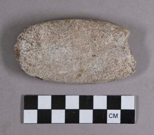 Ground stone, modified lithic, abraded cobble