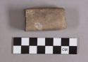 Ground stone, fragment of modified rectangular object