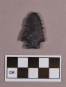 Chipped stone, projectile point, stemmed, serrated blade