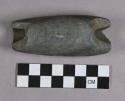 Ground stone, oval atlatl weight, tubular, fragmented