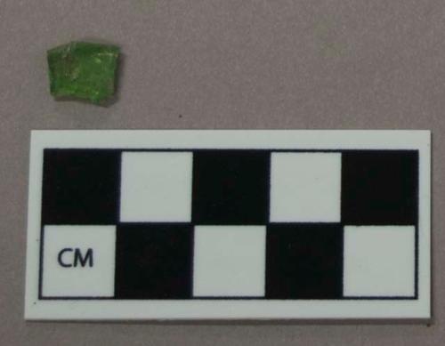 Glass, light green bottle fragment