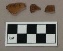 Glass, amber bottle body fragments