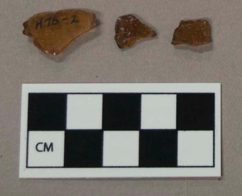 Glass, amber bottle body fragments