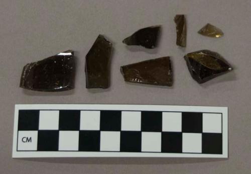 Glass, greenish-brown bottle body fragments