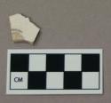 Ceramic, whiteware body sherd with partial maker's mark