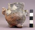 Small tripod pottery effigy jar