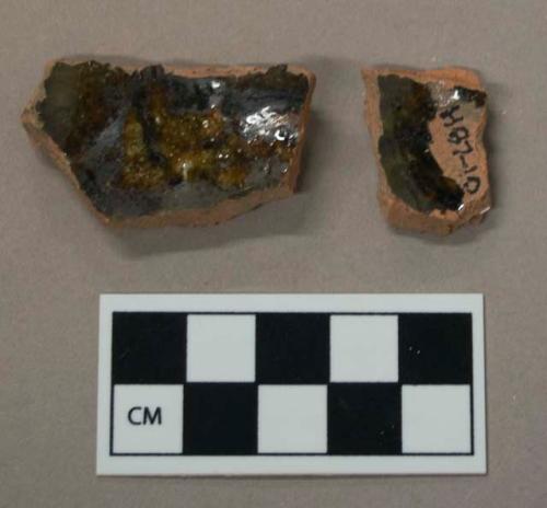 Ceramic, dark brown interior and exterior glaze redware body sherds