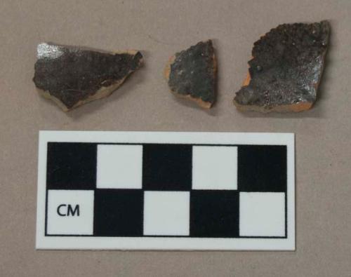 Ceramic, black glazed interior and exterior redware body sherd