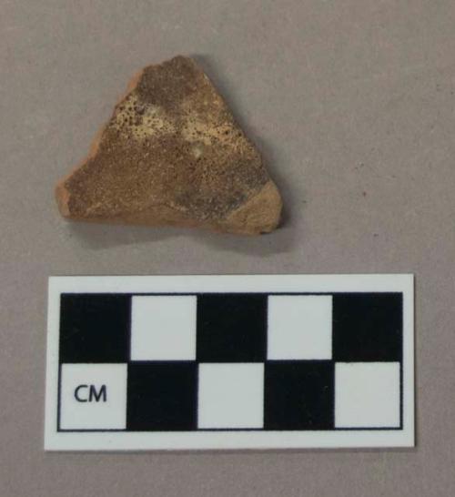 Ceramic, burned clear glaze redware body sherd